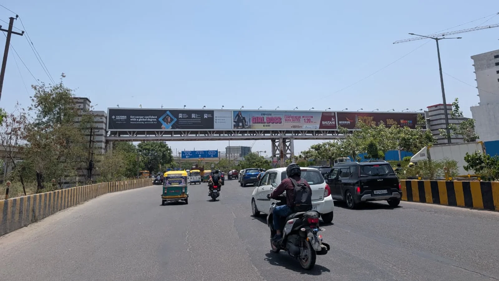 Hoarding at Pushp Vihar, Delhi — 25x10 ft front-lit outdoor advertising