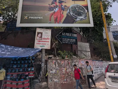 Hoarding at Def Col, Delhi — outdoor advertising
