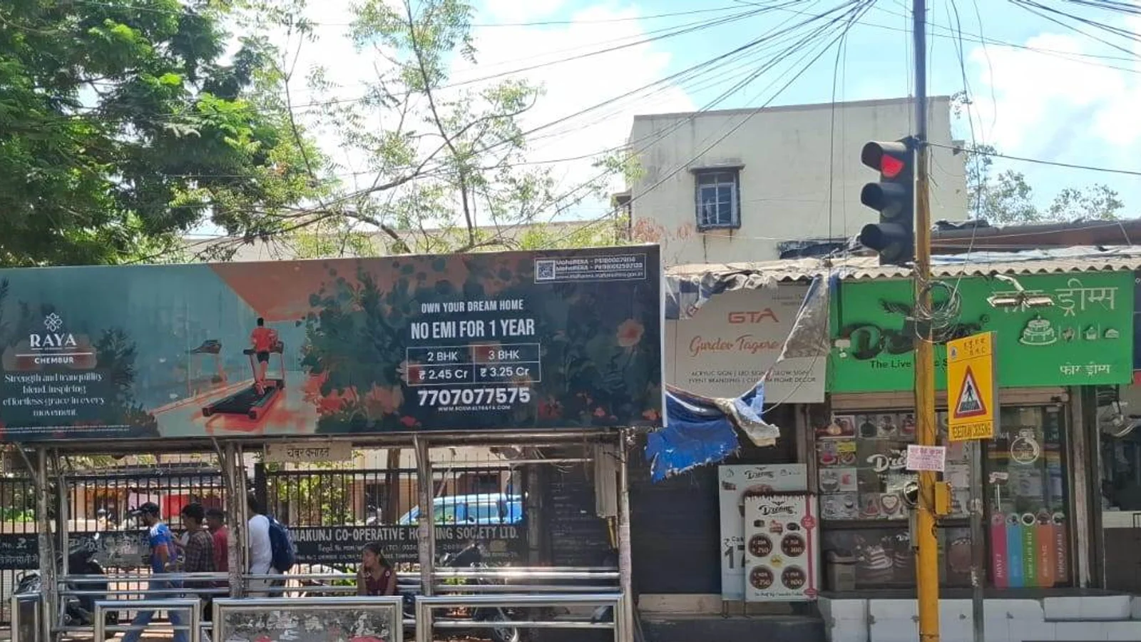 Bus Queue Shelter at Vile Parle West, Mumbai — back-lit outdoor advertising