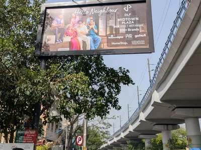 Hoarding at Daya Basti, Delhi — outdoor advertising