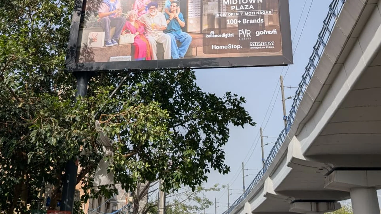 Hoarding — Daya Basti, Delhi — CupShup