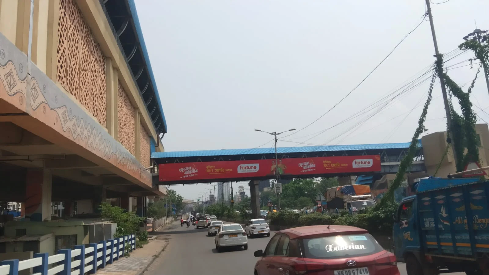 Hoarding in Kolkata — front-lit outdoor advertising