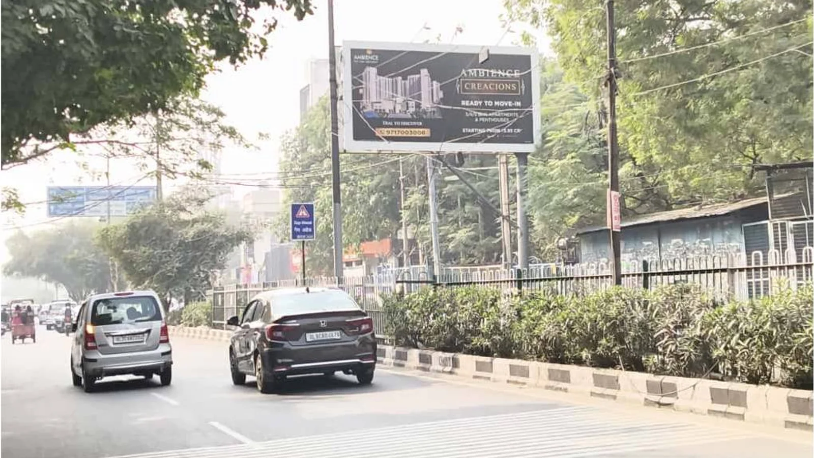 Hoarding at Pushp Vihar, Delhi — 20x10 ft front-lit outdoor advertising