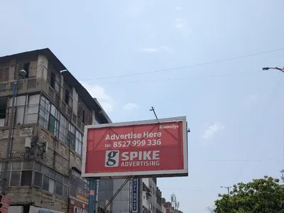 Hoarding at Chhatarpur, Delhi — outdoor advertising