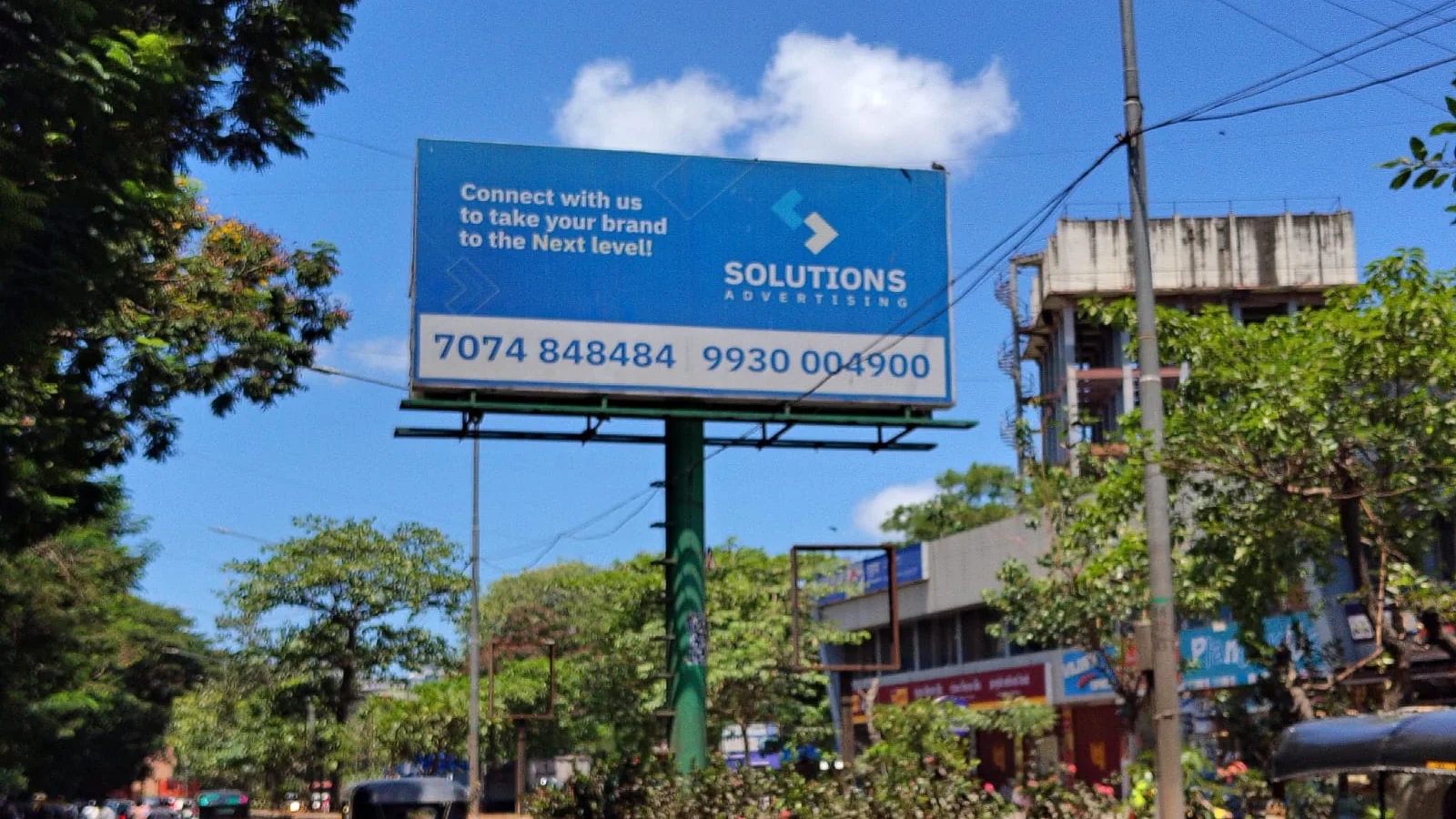 Bus Queue Shelter at Vile Parle West, Mumbai — back-lit outdoor advertising