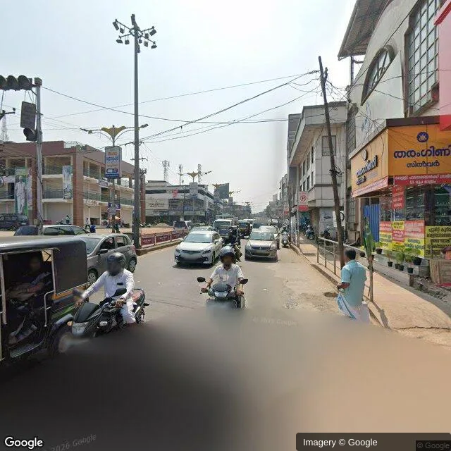 Hoarding at Karuvambram, Manjeri — outdoor advertising