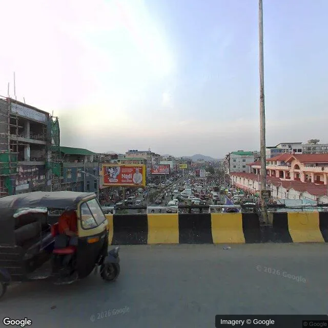 Hoarding at Thangal Bazar, Imphal — outdoor advertising