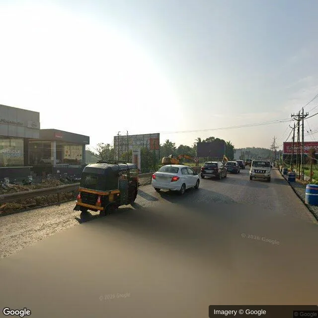 Hoarding at Vellanikkara, Thrissur — outdoor advertising